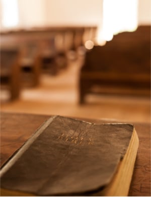 Bible and church pews
