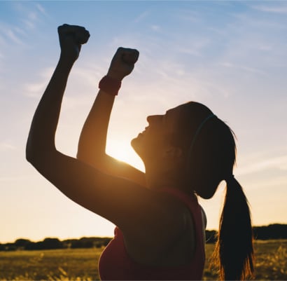 Woman celebrating with a fist pump