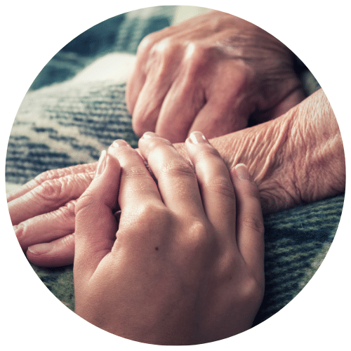Elderly and young hands together